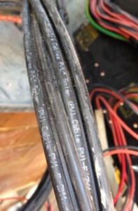 Solar cable standard and safety inspection for pre or post purchased property, Image of checking a solar system cables used  at a house meet government  requirements and electrical standards. Make sure no fire risk on wiring.
